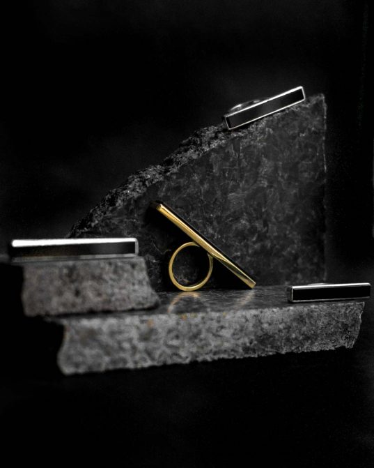 contemporary simplicity of clean lines cut onyx goes to the next level with its 14K (585°) solid gold frame.