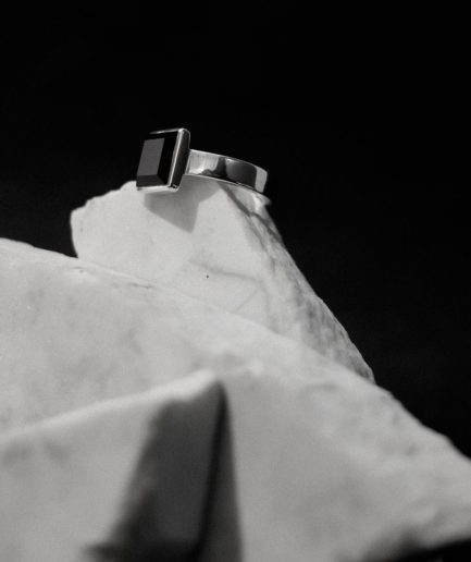 when it comes to notable men's ring, form selection is everything and this square onyx ring, set in sterling silver is excelent case in point.