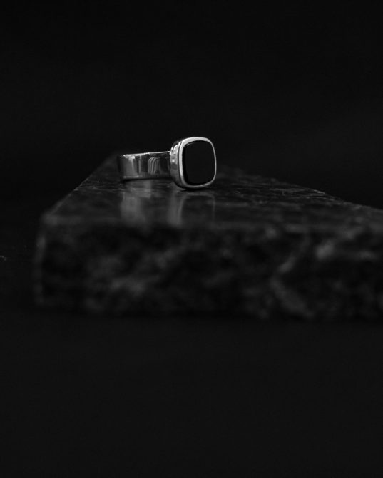 the new classic ___ notable mens signet ring, square onyx mixed with shiny sterling silver.