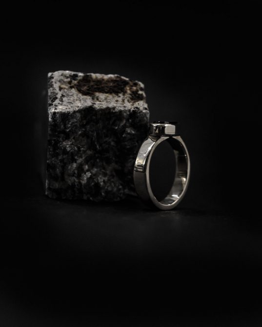 men's ring that's made from sterling silver and catchy onyx