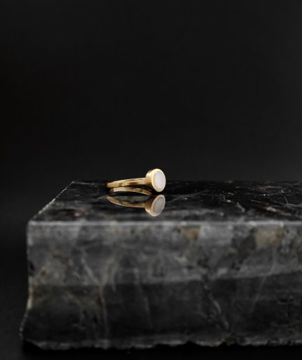 capture the power and sensuality of femininity by choosing this gold-plated sterling silver ring mixed with 7 mm milky cacholong opal. wear just one or mix with other RO STUDIO jewelry and create your own ring artwork.