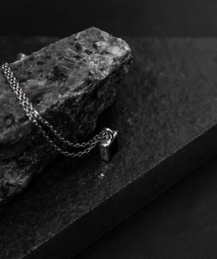 with a 7mm square onyx stone set in the center of a sterling silver frame, this pendant will create a captivating and magnetic atmosphere around you at all times ___match with our 170321 ring. silver chains are not included and must be purchased separately.