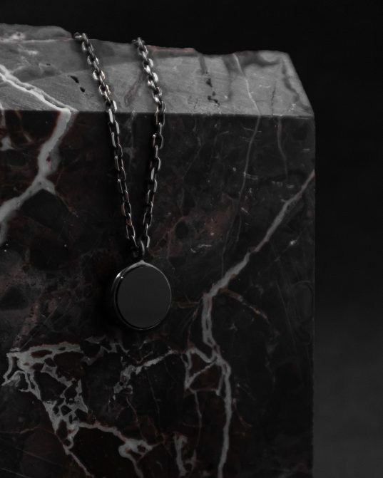 pendant with a 13 mm onyx set in the center of sterling silver frame ___match with our 180820 ring silver chains are not included and must be purchased separately.