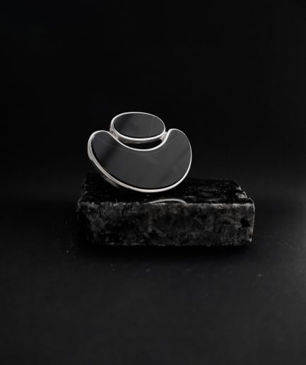 leave everyone breathless and own the space, by wearing this bold sterling silver ring with two different sized onyx pieces. the ring symbolizes the unity of two and their coherence.