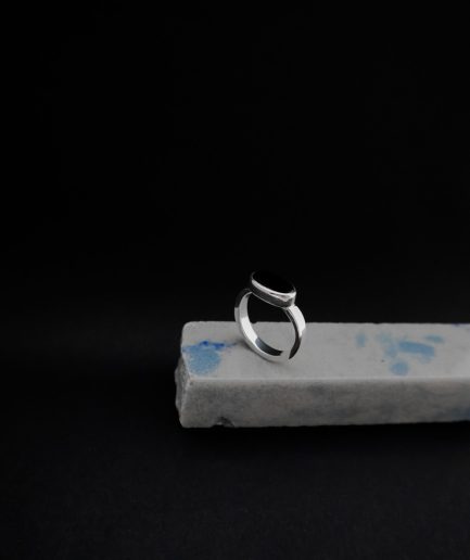 men's ring that's made from sterling silver, catchy onyx and designed for an effective modern appearance.